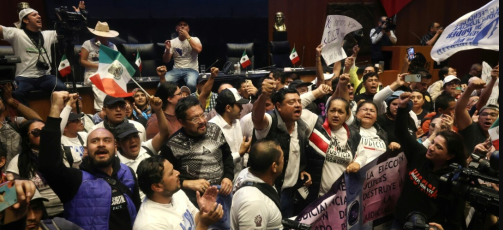 Protesters against judicial reform attack Mexico’s Senate, emulating Capitol assault.